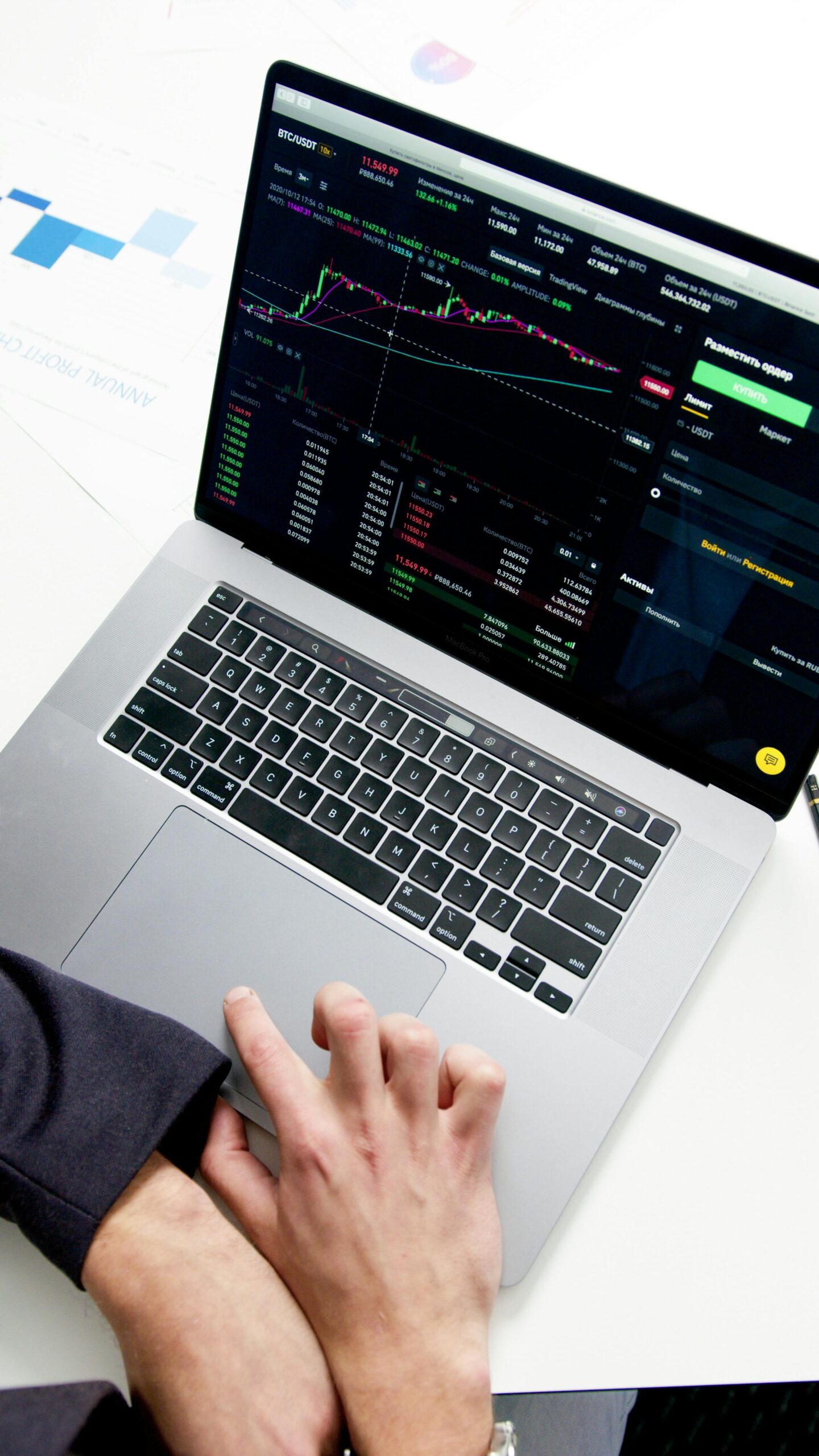 Laptop with trading chart